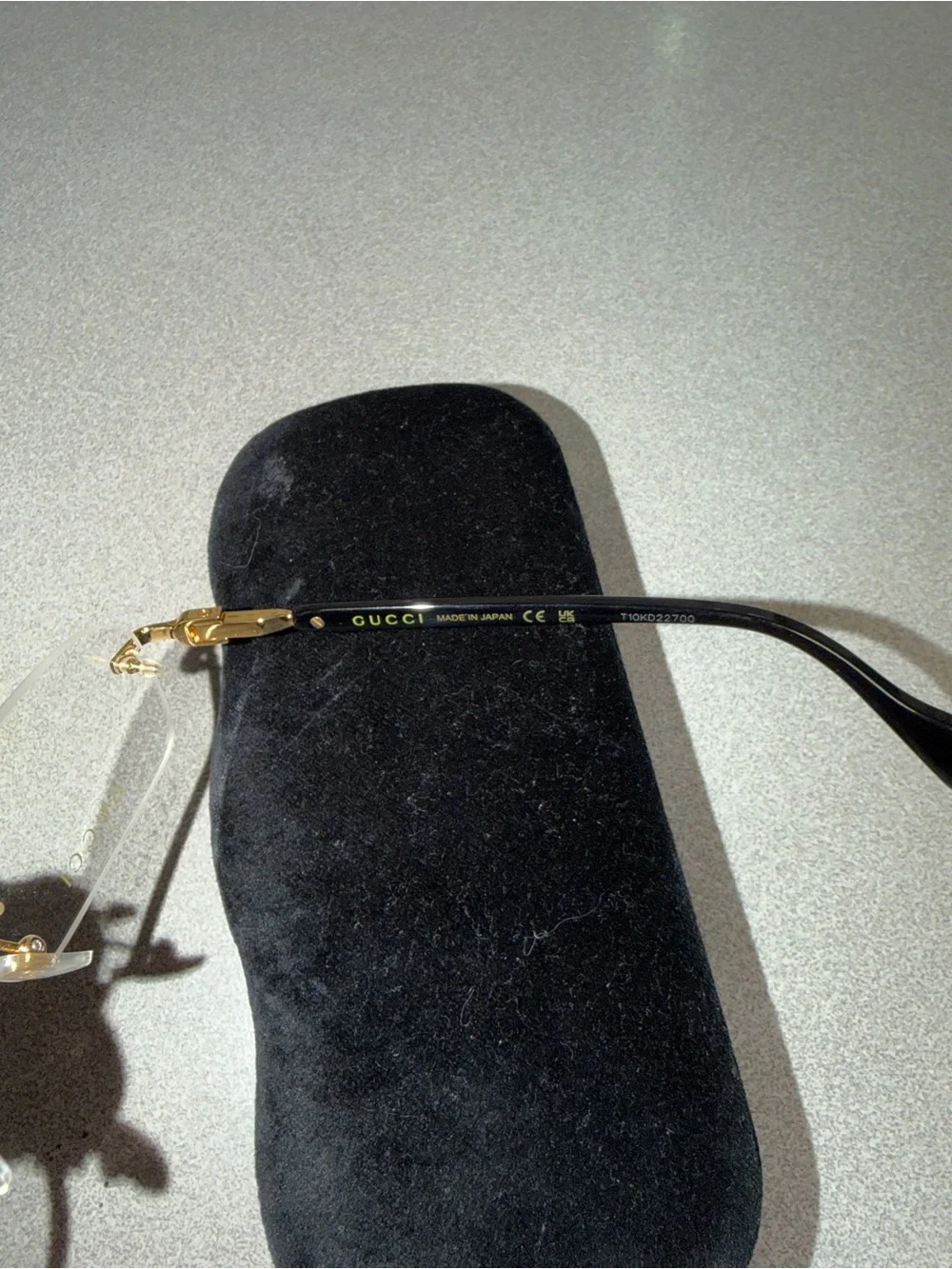 Gucci Men’s Rimless Eyeglasses Gold and Black Accents
